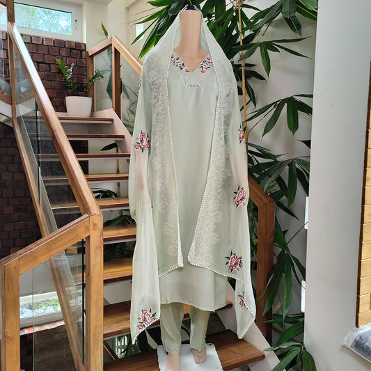 Elegant Pastel Green Embroidered Churidar Set with Dupatta
