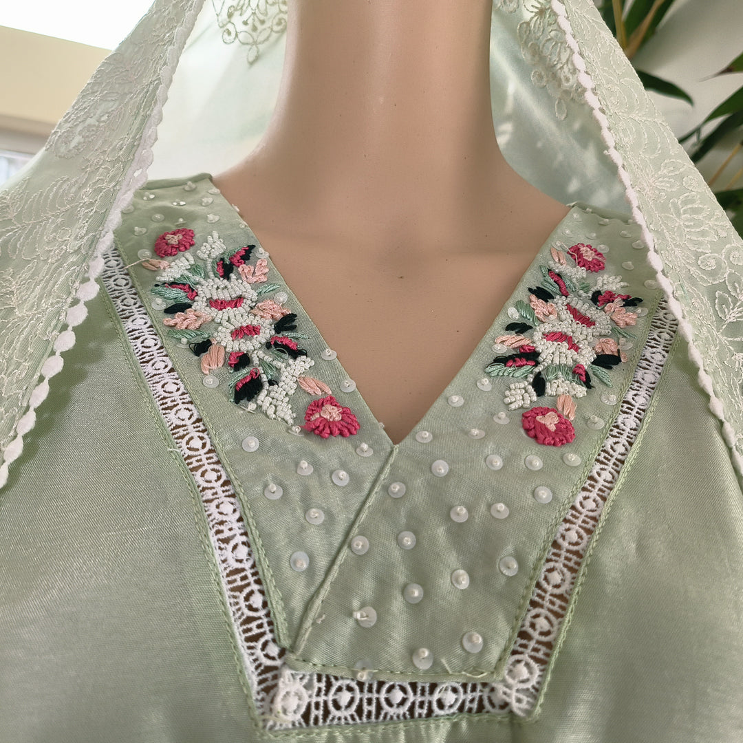 Elegant Pastel Green Embroidered Churidar Set with Dupatta