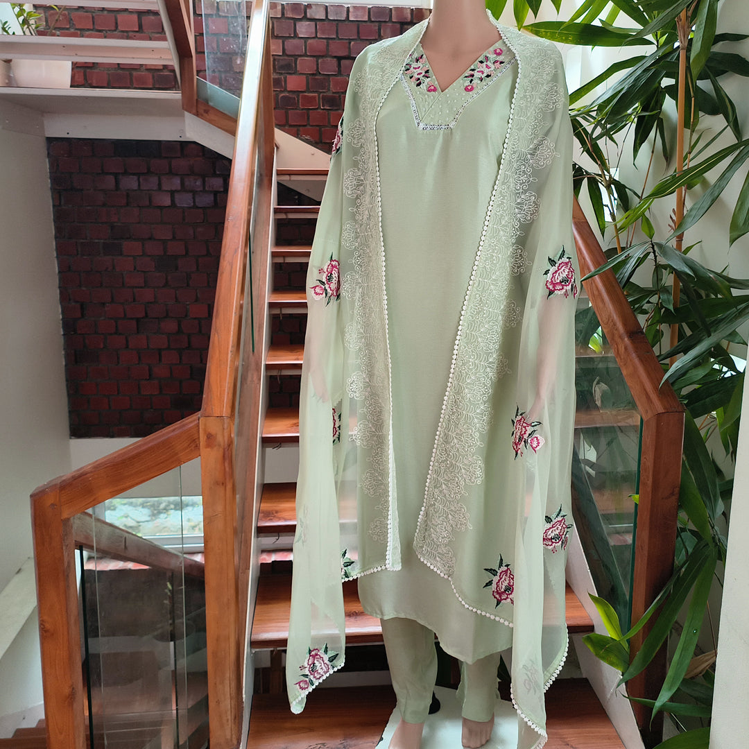 Elegant Pastel Green Embroidered Churidar Set with Dupatta