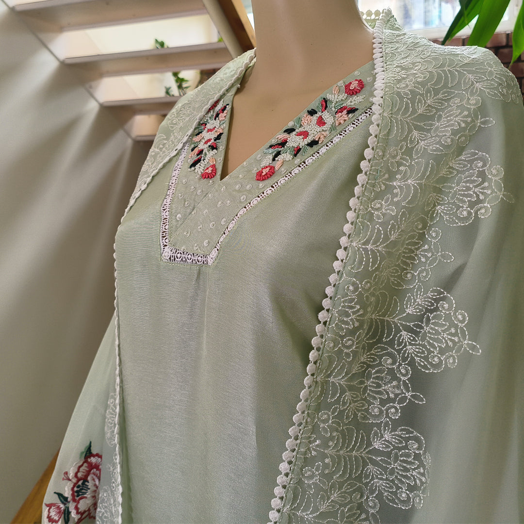 Elegant Pastel Green Embroidered Churidar Set with Dupatta