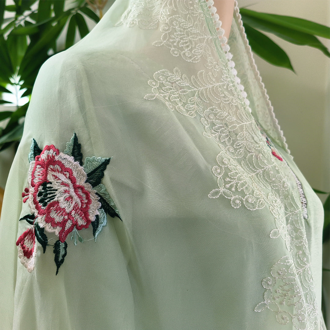 Elegant Pastel Green Embroidered Churidar Set with Dupatta